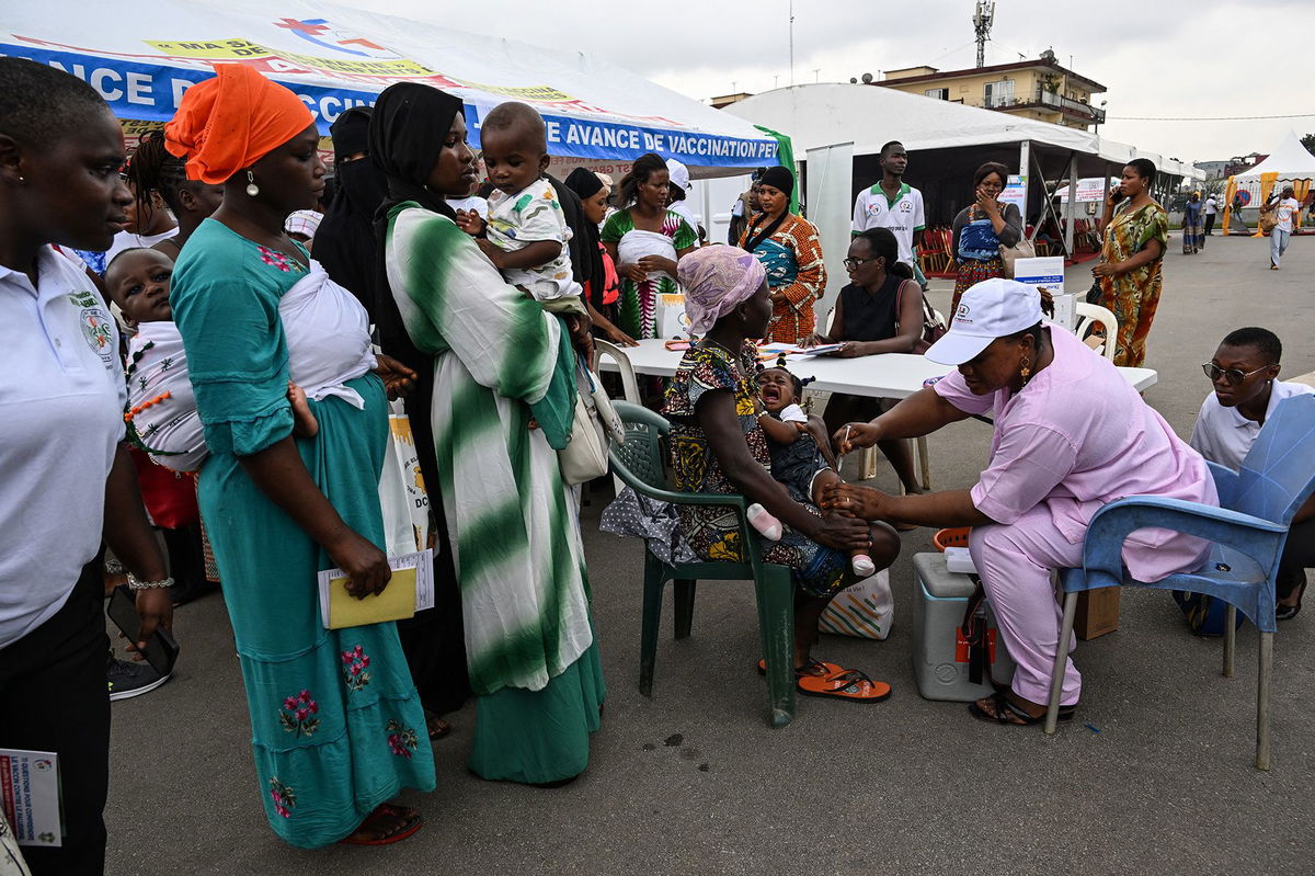 <i>Luc Gnago/Reuters via CNN Newsource</i><br/>A health employee prepares to give a malaria injection to a child during the official ceremony for the launch of a malaria vaccination campaign in Ivory Coast.