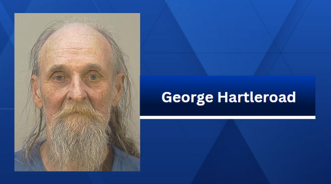 <i>KCCI via CNN Newsource</i><br/>Officers stopped George Hartleroad on June 26 for not having a rear reflector on his bicycle.