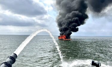 Off-duty firefighter Jason Edwards helped rescue six men from the water near the James River Bridge on Sunday. Aftermath of a boat fire can be seen in this image from Suffolk Fire and Rescue.