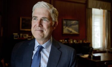 Supreme Court Justice Neil Gorsuch poses for a portrait in his office at the Supreme Court on July 29