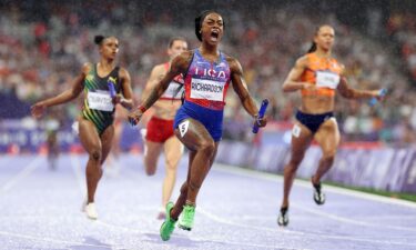 Kenya's Beatrice Chebet leads ahead of Italy's Nadia Battocletti in the women's 10000m final of the athletics event at the Paris 2024 Olympic Games at Stade de France in Saint-Denis