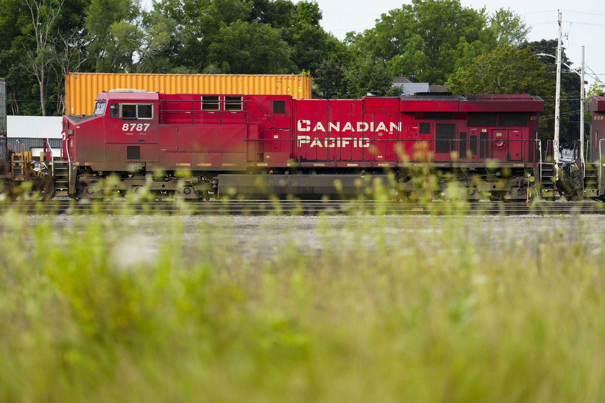 <i>Sean Kilpatrick/The Canadian Press/AP via CNN Newsource</i><br/>Trains sit idle at a Canadian Pacific Kansas City rail yard in Smiths Falls