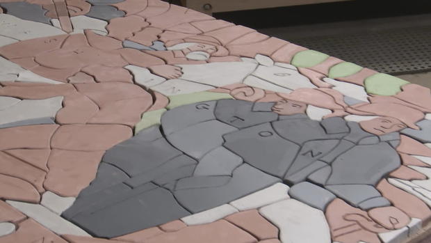 <i>KYW via CNN Newsource</i><br/>James Mowery meticulously assembles the pieces of a large mosaic