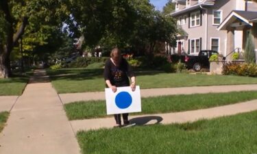 'Blue dot' signs popping up in Omaha