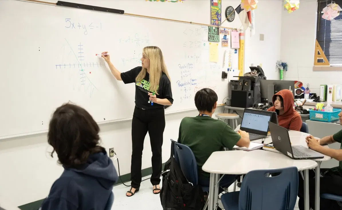 Elizbeth Sierra, an eighth grade Algebra 1 teacher at Willima D. Slider Middle School, teaches students to plot a graph from an equation. Socorro Indepenent School District has been a leader in efforts to get students to pass the subject in eighth grade, one of the key initiatives of the Council on Regional Economic Advancement and Educational Development.