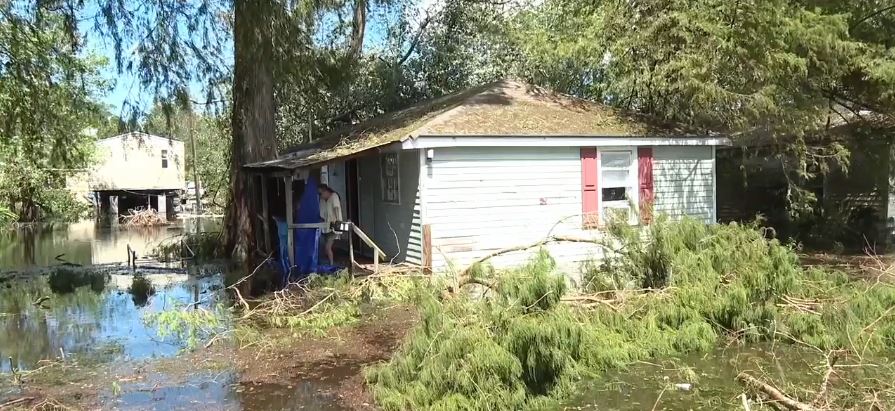 <i>KATC via CNN Newsource</i><br/>The water was too high for KATC's camera crew to reach Vinging to interview her. We could only speak with her about her home using cell phones.