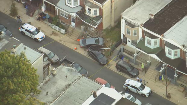 <i>KYW via CNN Newsource</i><br/>Philadelphia police are searching for three men who they say stole a car at gunpoint and then crashed it into a home in West Philadelphia.