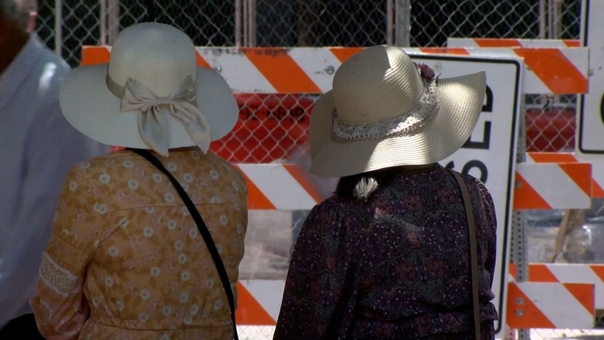 Women wear sun hats in Downtown El Paso 