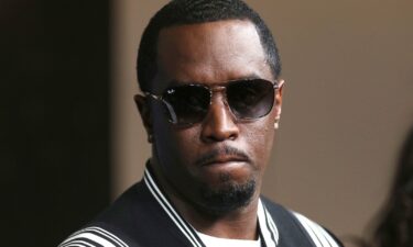 US Attorney Damian Williams pointed at a chart on September 17 showing the firearms seized during the search of Sean "Diddy" Combs' homes.