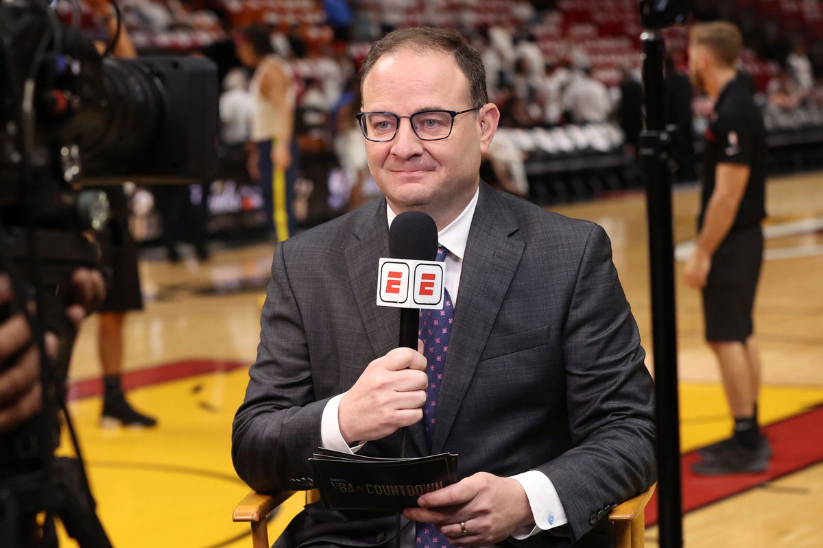 <i>Chris Marion/NBAE/Getty Images via CNN Newsource</i><br/>Adrian Wojnarowski reporting during the 2024 NBA Draft on June 26 at Barclays Center in Brooklyn