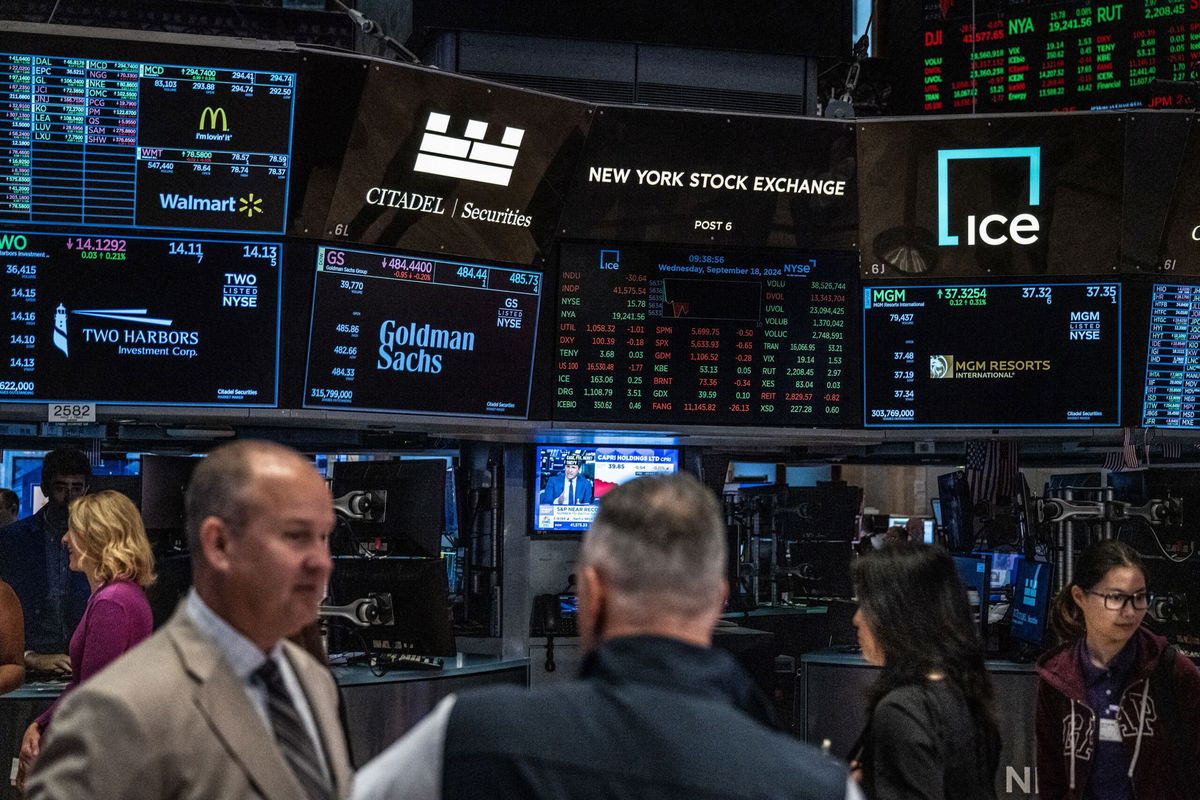 <i>Stephanie Keith/Getty Images via CNN Newsource</i><br/>Traders work on the floor of the New York Stock Exchange on September 18 in New York City.