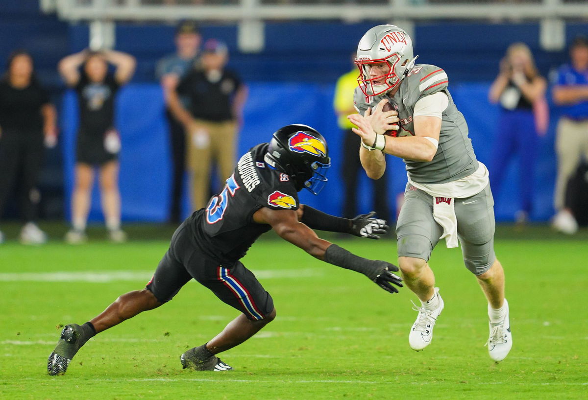 <i>Jay Biggerstaff/USA Today Sports/Reuters via CNN Newsource</i><br/>UNLV Rebels quarterback Matthew Sluka (right) says he will sit out the rest of the season.