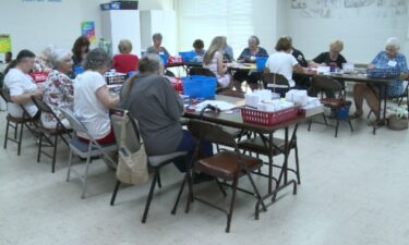 Pictured are women busily working on greeting cards at St. Nicholas Catholic Church in Virginia Beach