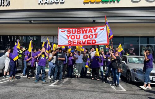 Los Angeles fast-food cooks and cashiers rallied Tuesday at a Subway in Eagle Rock to show support for Eva Rodriguez